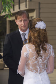 A man and woman standing next to each other.