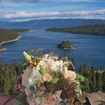 A bouquet of flowers on top of a mountain.