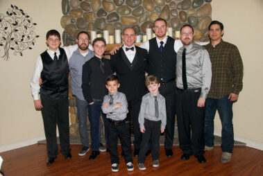 A group of men standing next to each other.