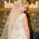 A bride in her wedding dress and veil