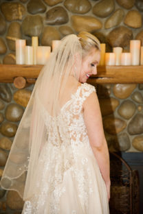 A bride in her wedding dress and veil