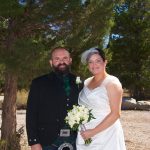 A man and woman posing for a picture.