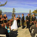 A wedding ceremony with a view of the water.